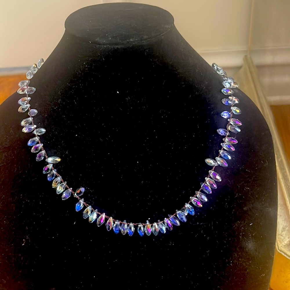 Sparkly blue stone necklace on leather